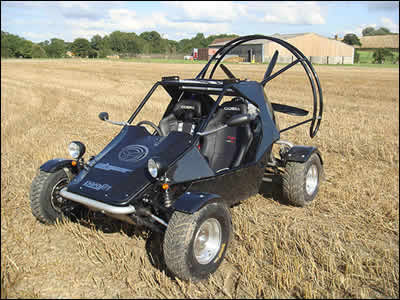 Independent 4-wheel suspension gives this powered parachute the ability to move off-road.